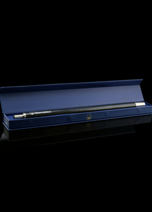 Steamulation Carbon Mouthpiece in blue finish inside box – dark view.
