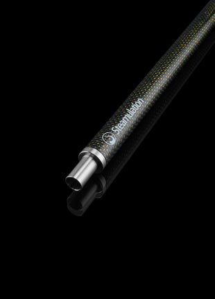 Close-up of Steamulation Carbon Mouthpiece in gold finish on black background.
