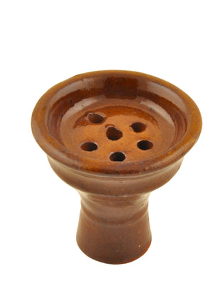 Another perspective of the clay bowl with holes