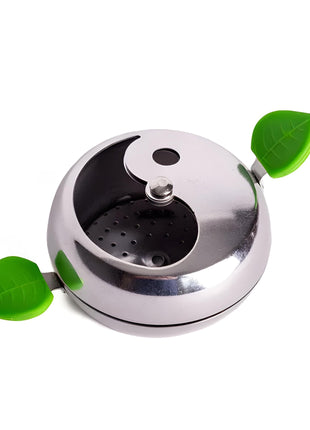 AOT Provost 3 Heat Controller with the lid open, showcasing the perforated tray for optimal charcoal placement.