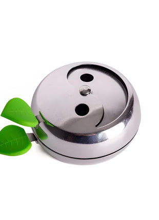 Top-down view of the AOT Provost 3 Heat Controller with green handles, highlighting its sleek and functional design.